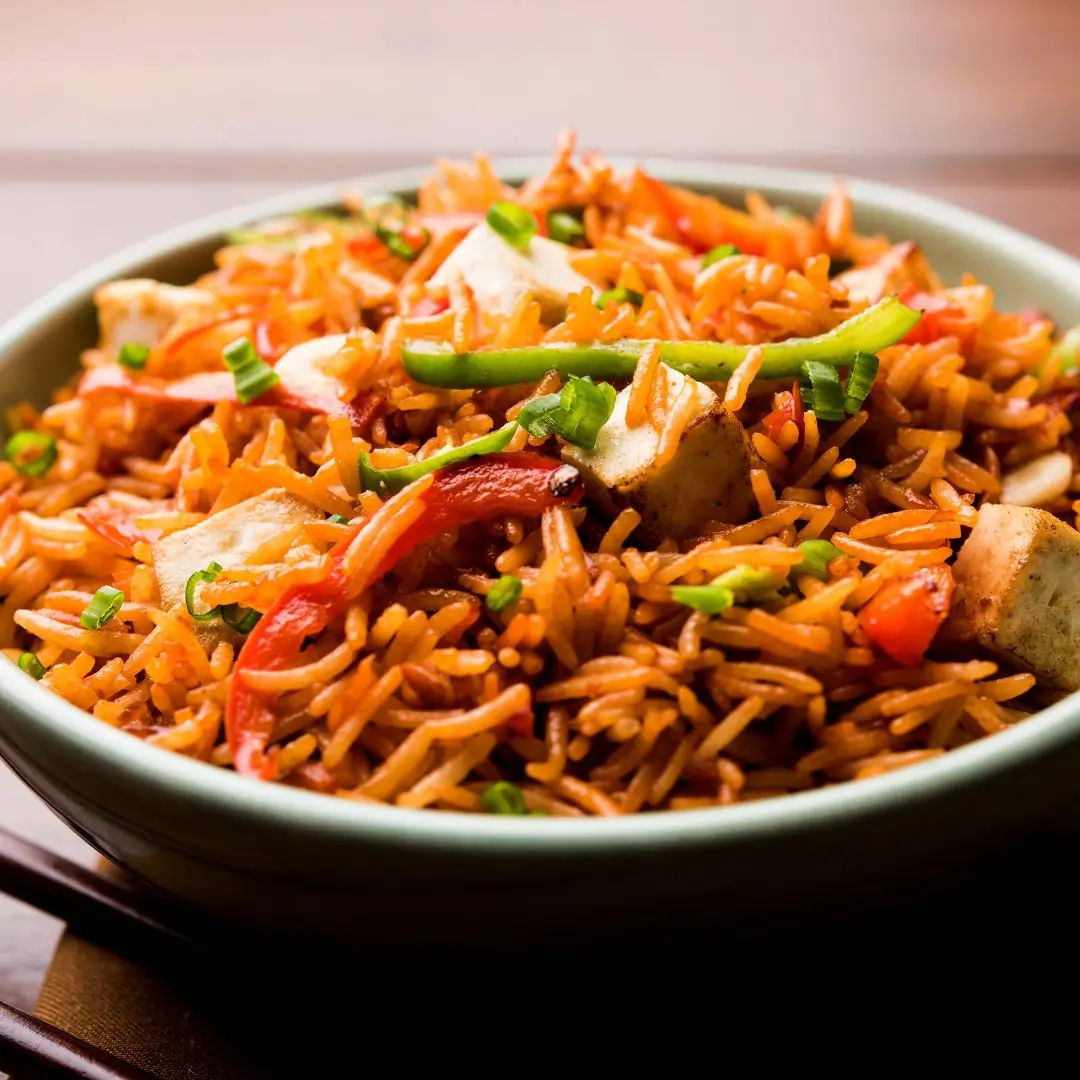 https://instamart-media-assets.swiggy.com/swiggy/image/upload/fl_lossy%2Cf_auto%2Cq_auto%2Ch_960%2Cw_960//InstamartAssets/2/schezwan_fried_rice.webp?updatedAt=1730797766608