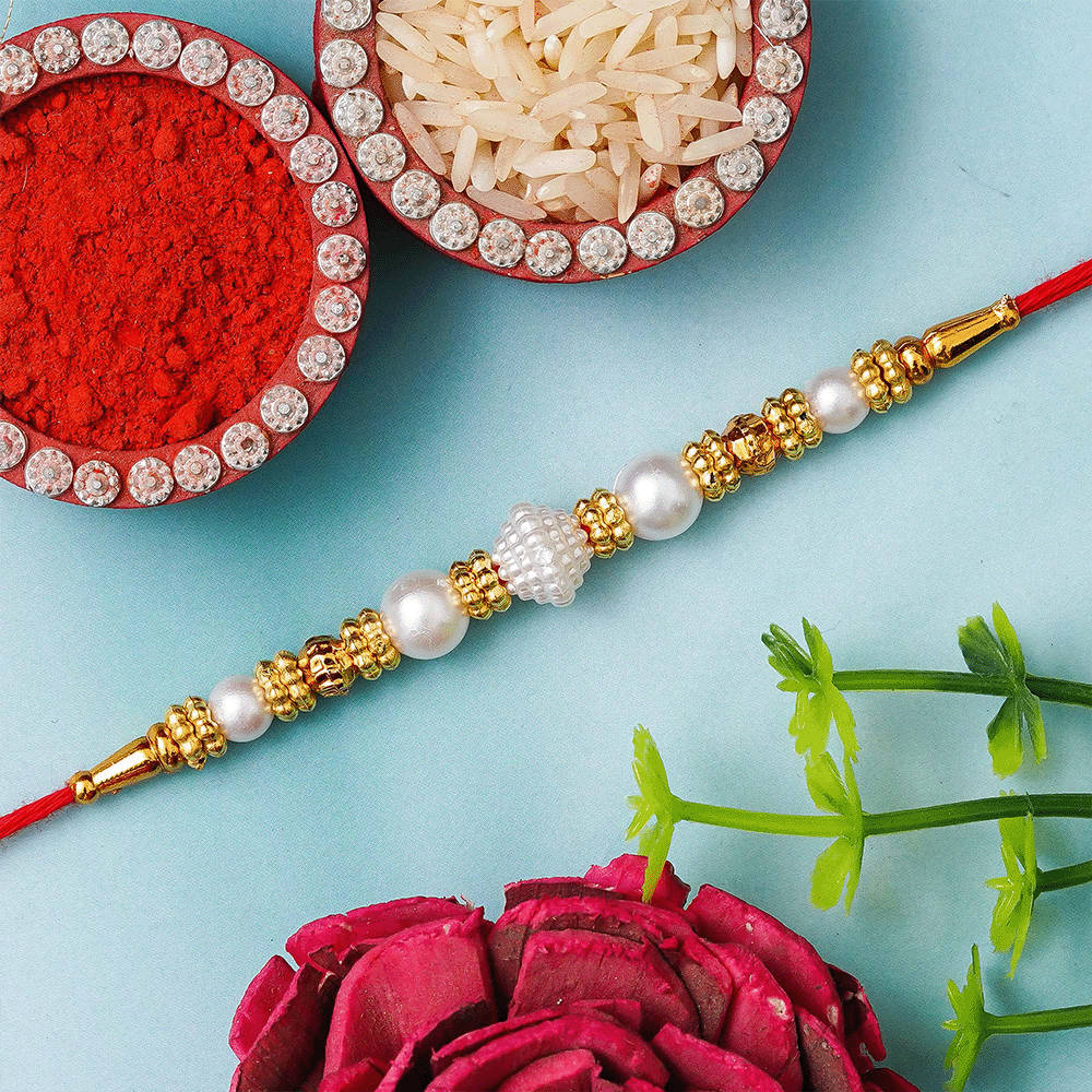 Sneh Designer Ganesha Rakhi and Ferrero Rocher Combo Delivery in